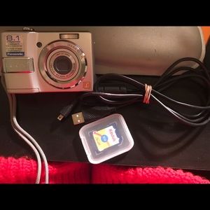 Panasonic  camera w/ cord +2gb memory card